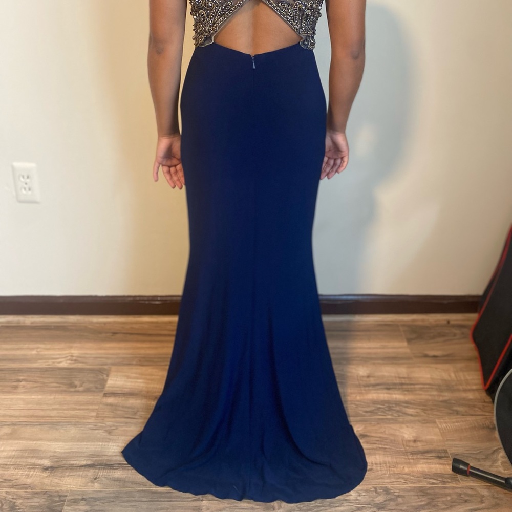 Elegant gown with gold beading.